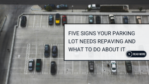 A parking facility with parked cars, a blog title, and a "read more" button beside it.